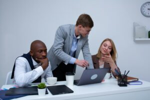 Sales colleagues having a conversation in the office.
