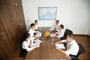 People in the middle of a meeting.